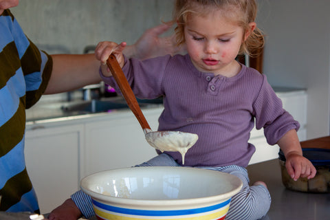baking, mixing batter for hotcakes 