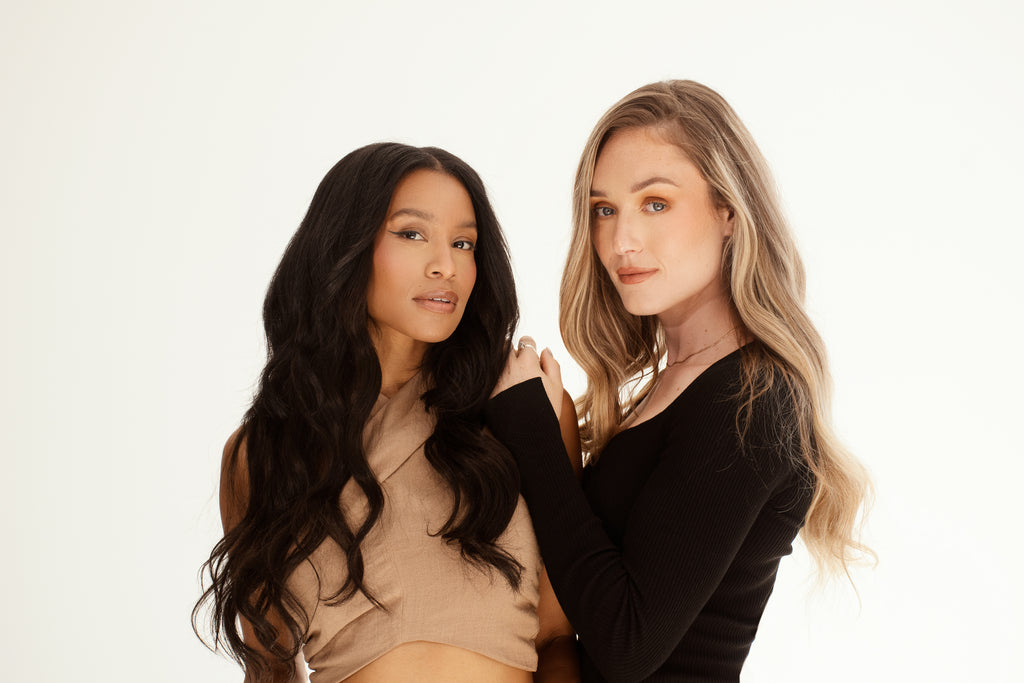 Image of two models wearing Frontrow clip-in human hair extensions