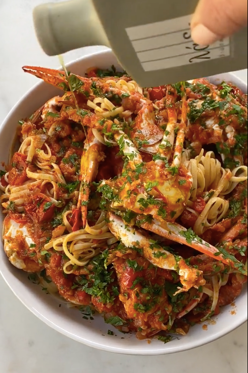 crab marinara recipe. drizzle the best greek olive oil on top.