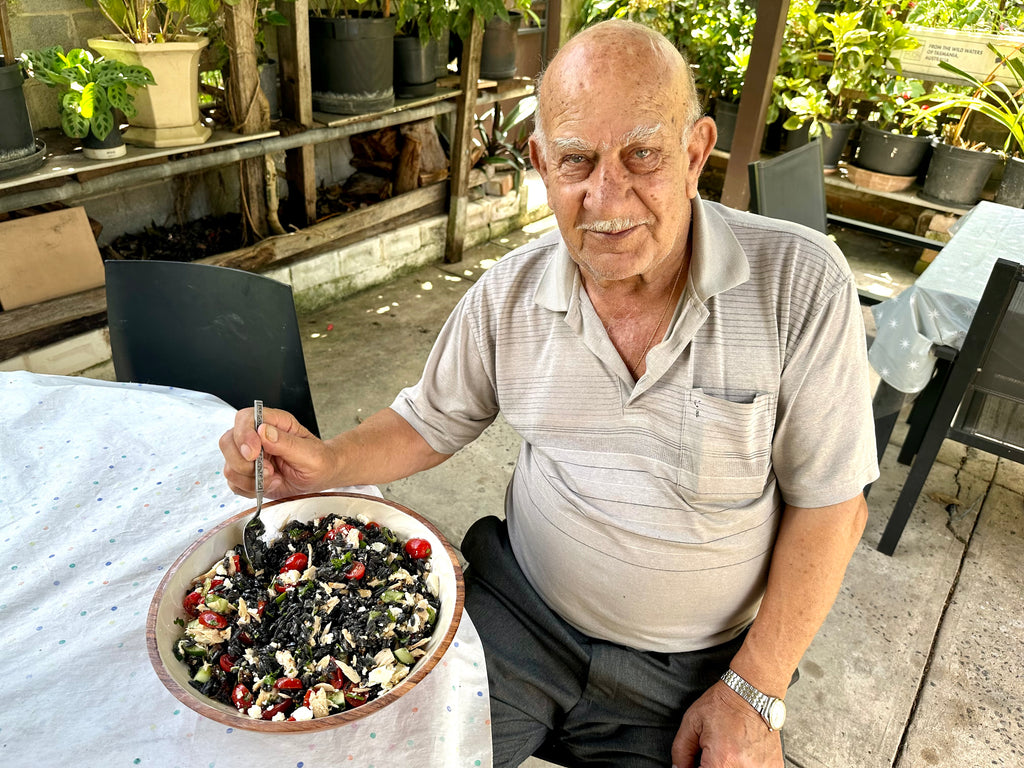 Greek and mediterranean summer salad with tuna and Greek orzo.