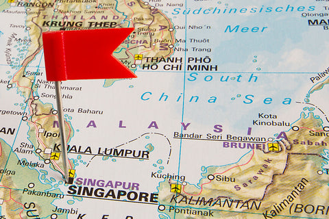flag pin on map showing Singapore