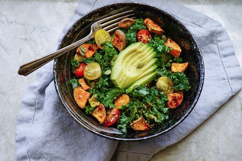 kale, roasted yams, and avocado salad