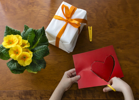 Making a Valentine's Present with card and flowers