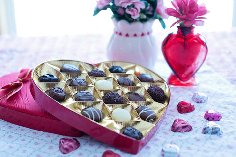 Valentine's Candy and vase of flowers