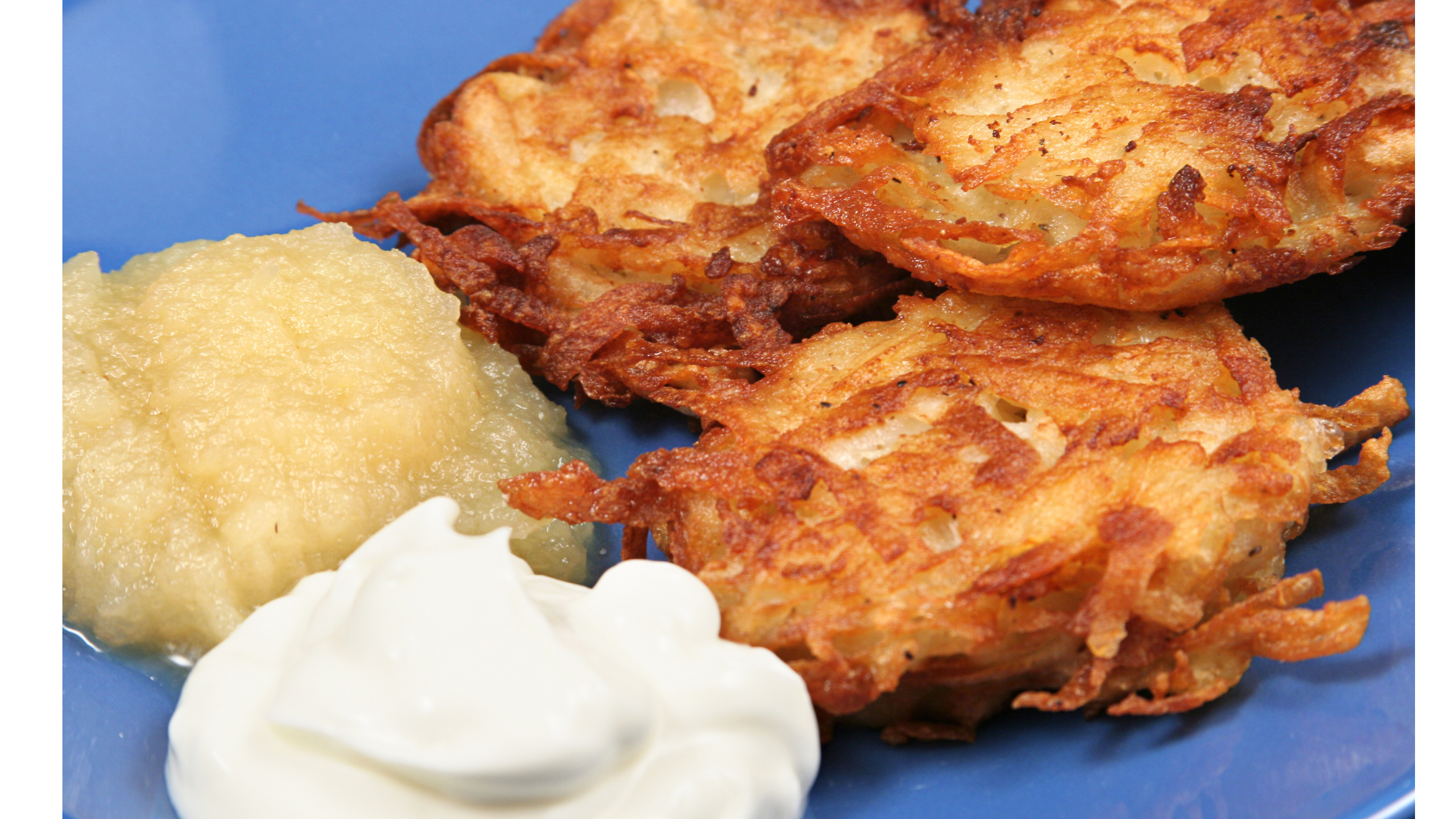 potato latkes with sour cream and applesauce for hanukkah