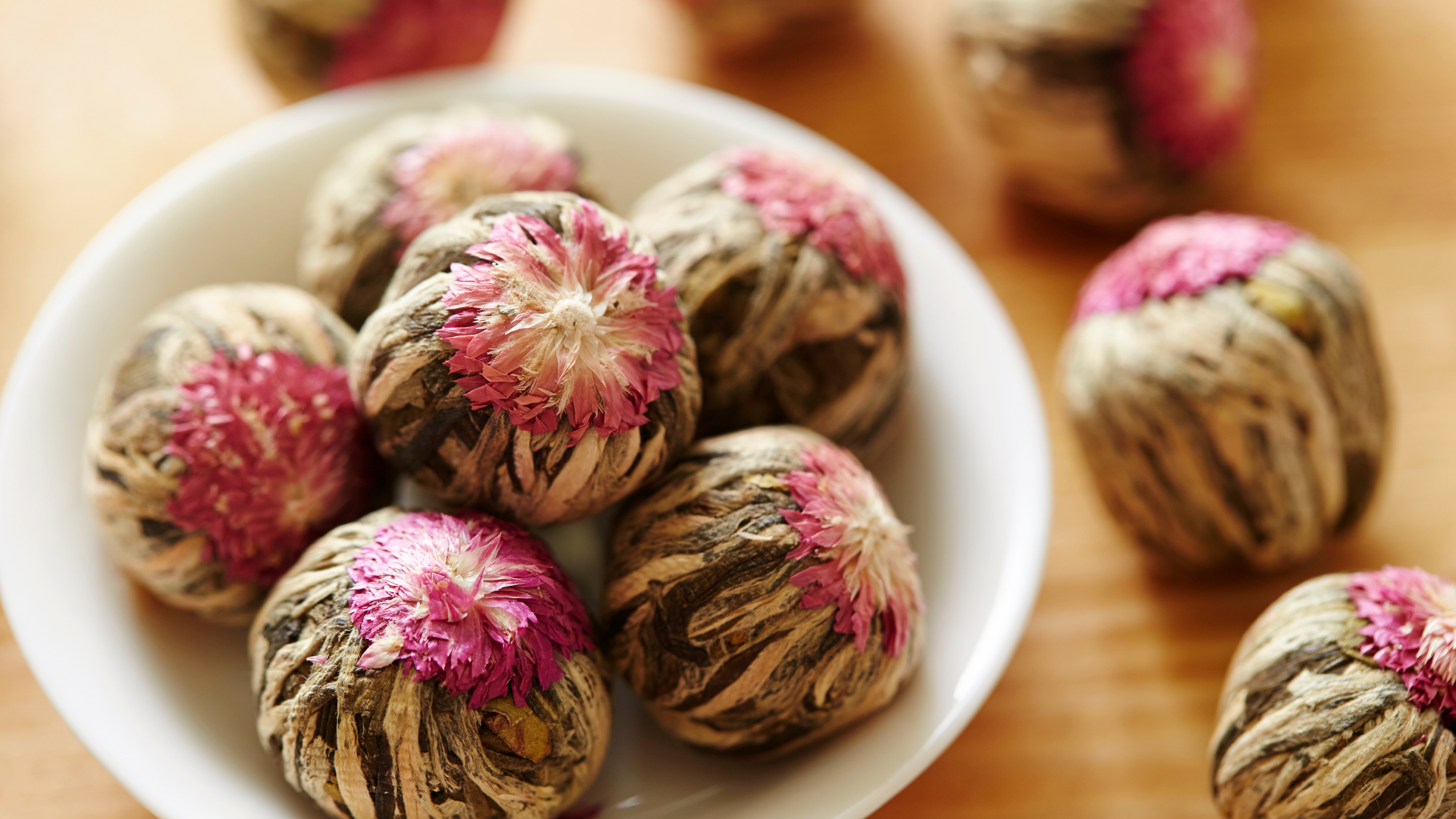 flowering tea bundles in a bowl