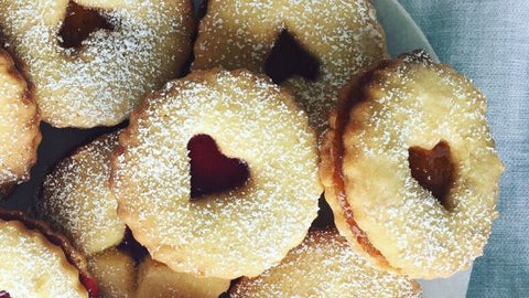 Linzer cookies with heart shaped cutout