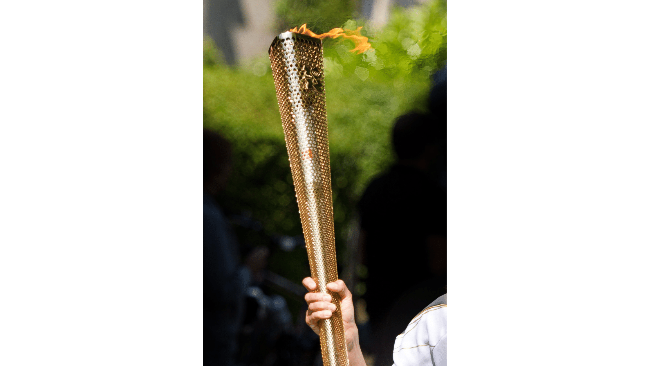 Olympic torch relay person holding torch