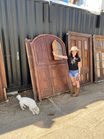 Mary Hollis and a unique window with tons of shutters and compartments.  