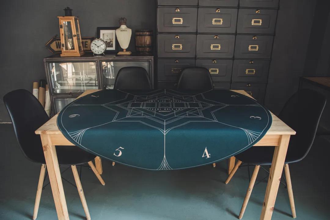 rich graphics inspired by Art Deco Design are featured in SLOWPLAY's Nash Poker Mat