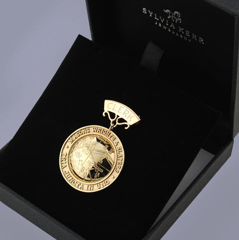 Solid 9ct yellow gold handmade Clerks Badge in black presentation case.