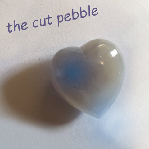 the now cut pebble into a heartshaped gemstone