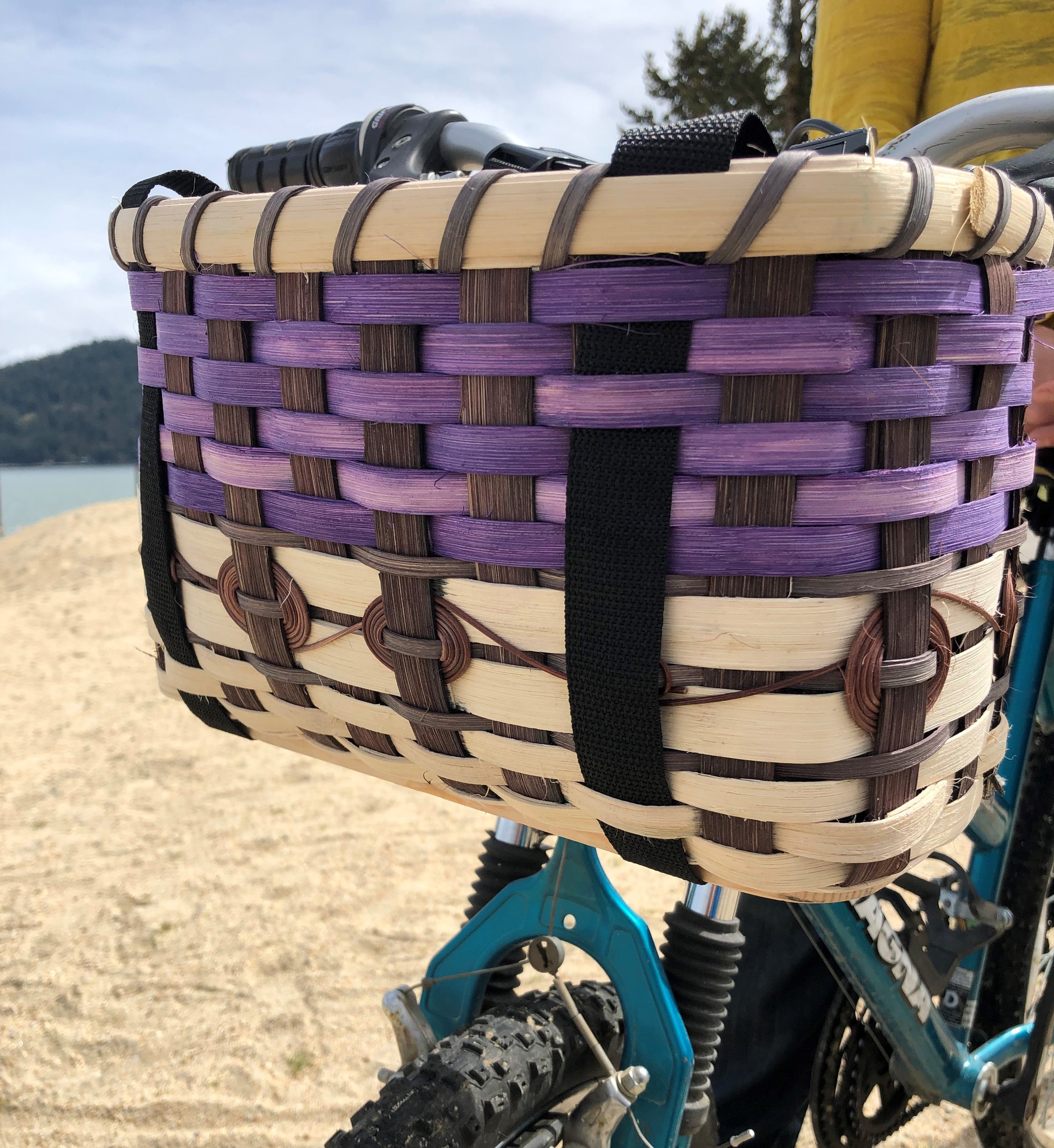 purple bicycle with basket