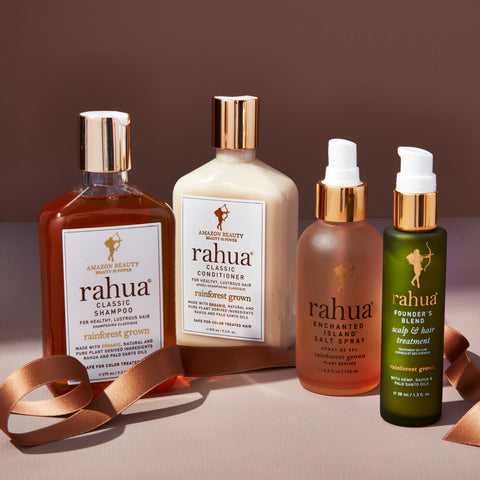 Rahua scalp and hair care products on the table with brown ribbon