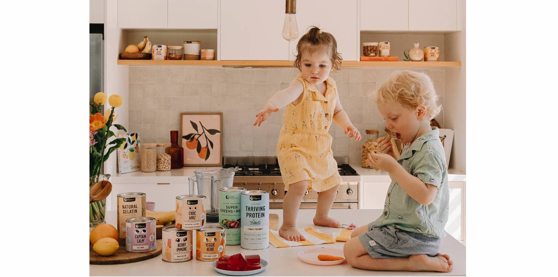 kids range with two small children in kitchen 