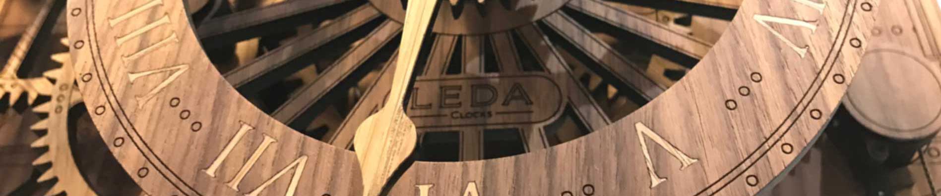 wooden walnut clock face with oak marquetry roman numerals