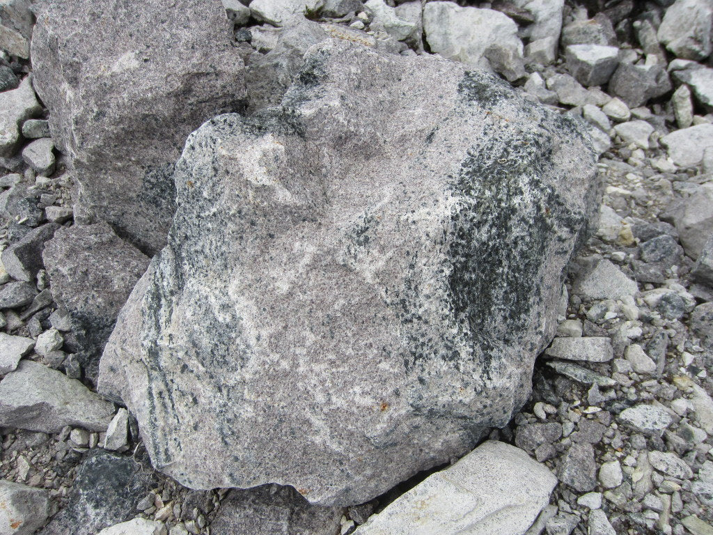 Anorthosite rock, found in areas of Harris and also on the moon...