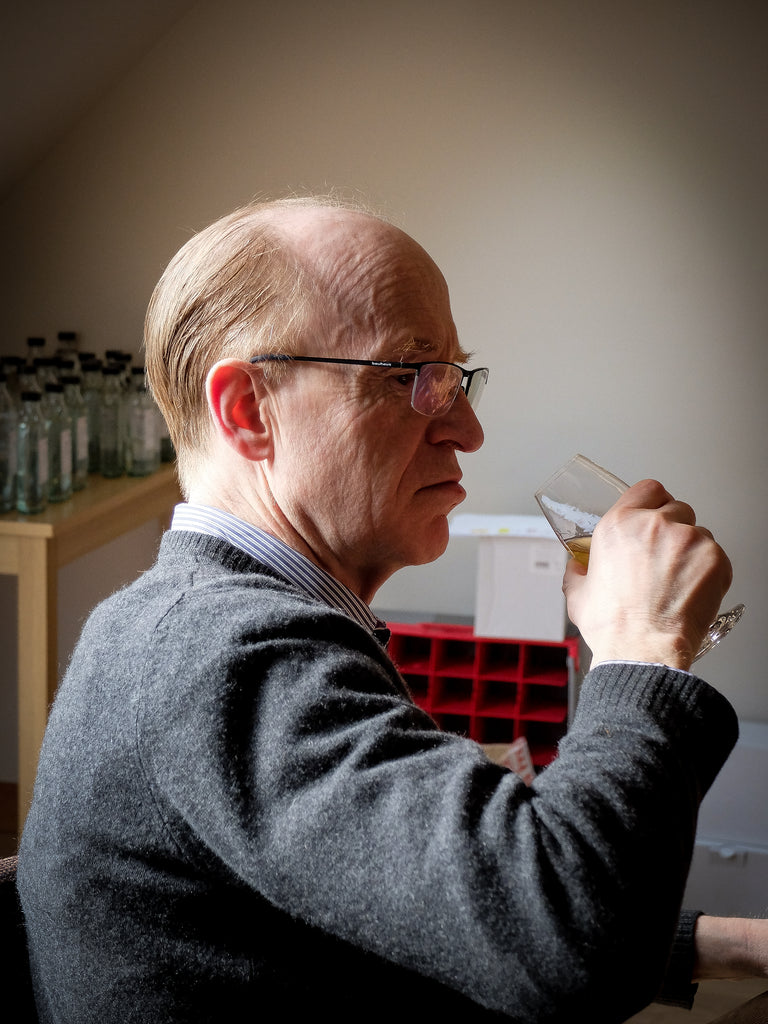 Managing Director Simon Erlanger tastes his whisky.