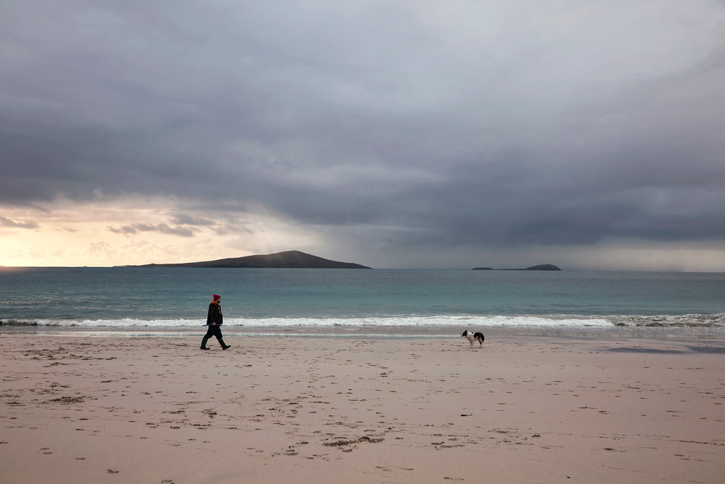 The storyteller and his dog, Northton, Isle of Harris.