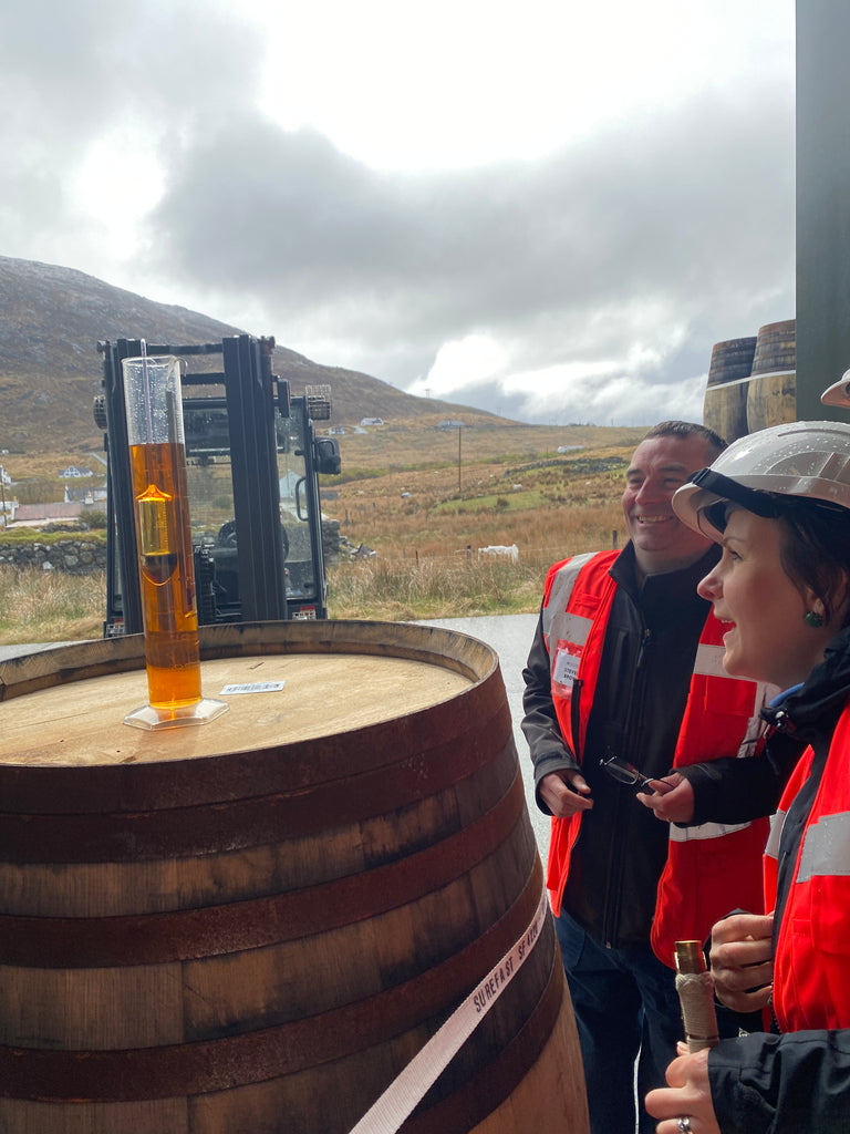 Shona at our Ardhasaig warehouse taking samples from our casks.