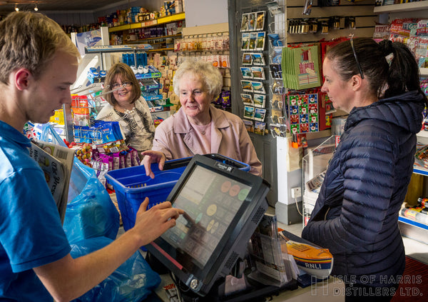 News and gossip at Brownie's shop, Tarbert.