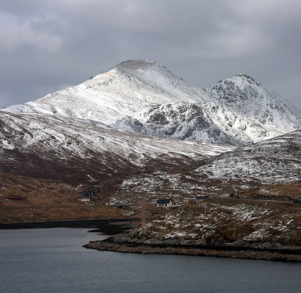 The snow dusted hills of Harris, where the journey begins.