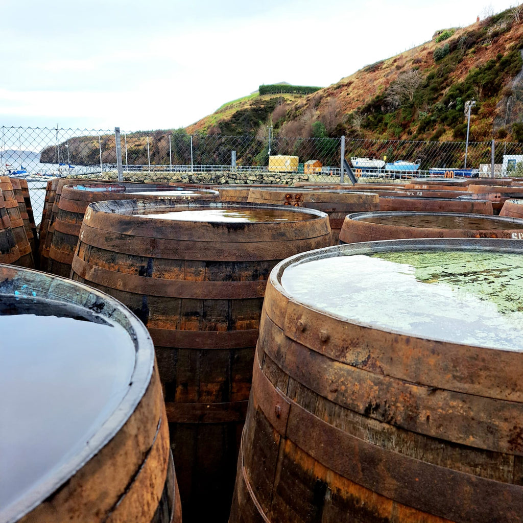 Some beautiful oak barrels and butts by the sea.