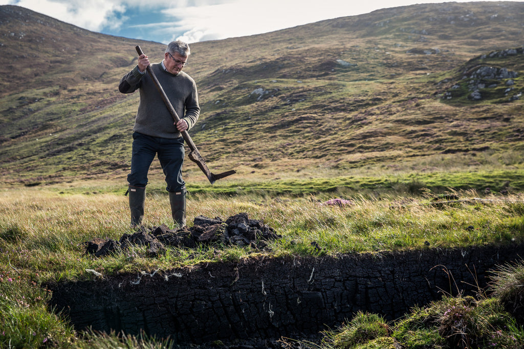 Head Distiller Kenny Maclean at the peat bank, South Harris.