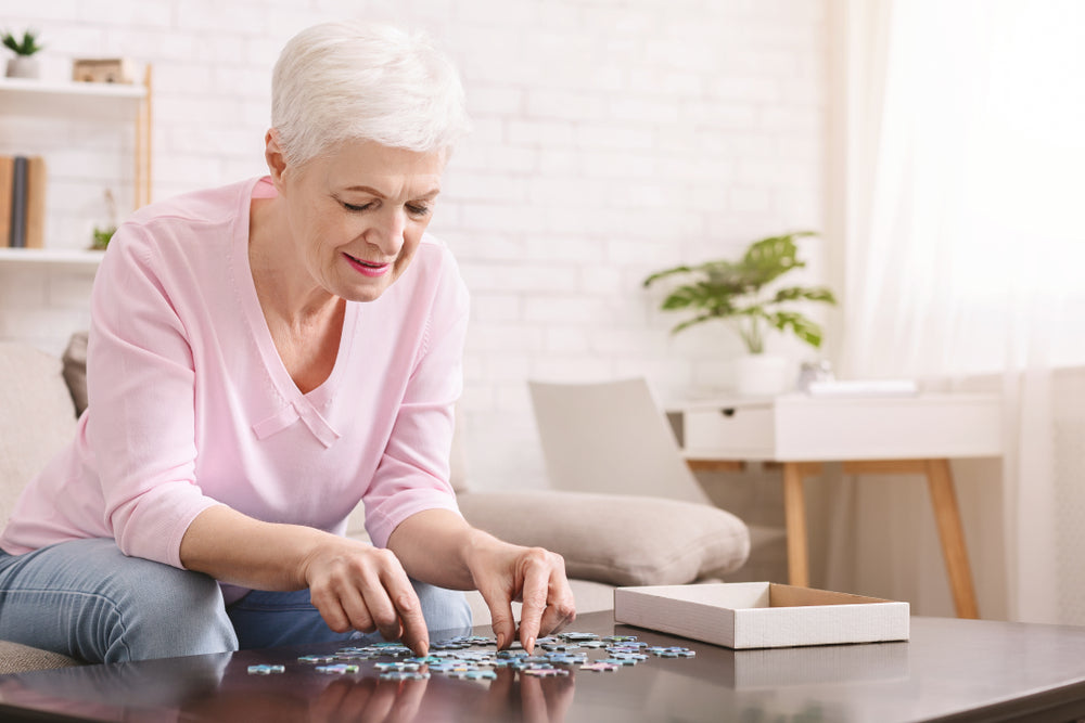 Woman playing with puzzle