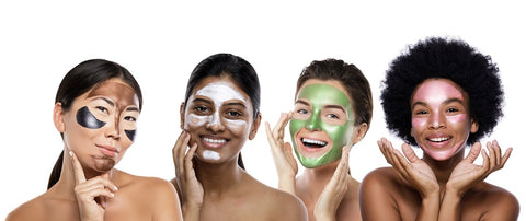 Four ladies of different ethnicities and different skin types applying different products