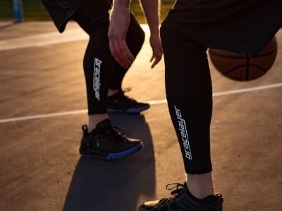 Two men wearing Bracelayer's padded Basketball Compression Pants, Bracelayer compression pants padded, compression gear for basketball, basketball compression