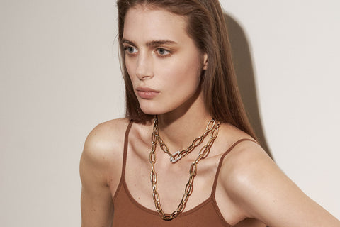 Girl Wearing Gold Necklaces