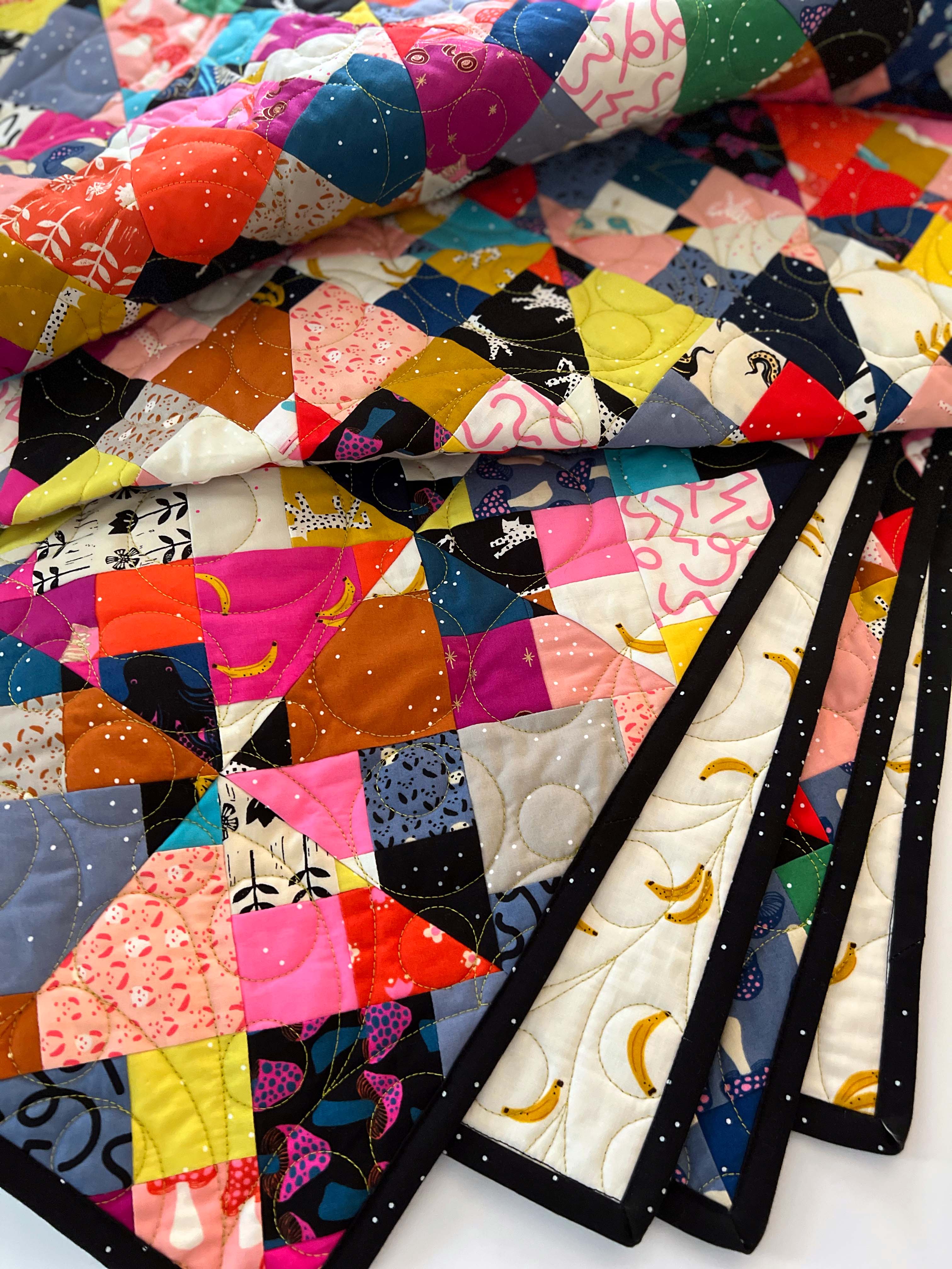 Utter Chaos quilt peekaboo at backing fabric