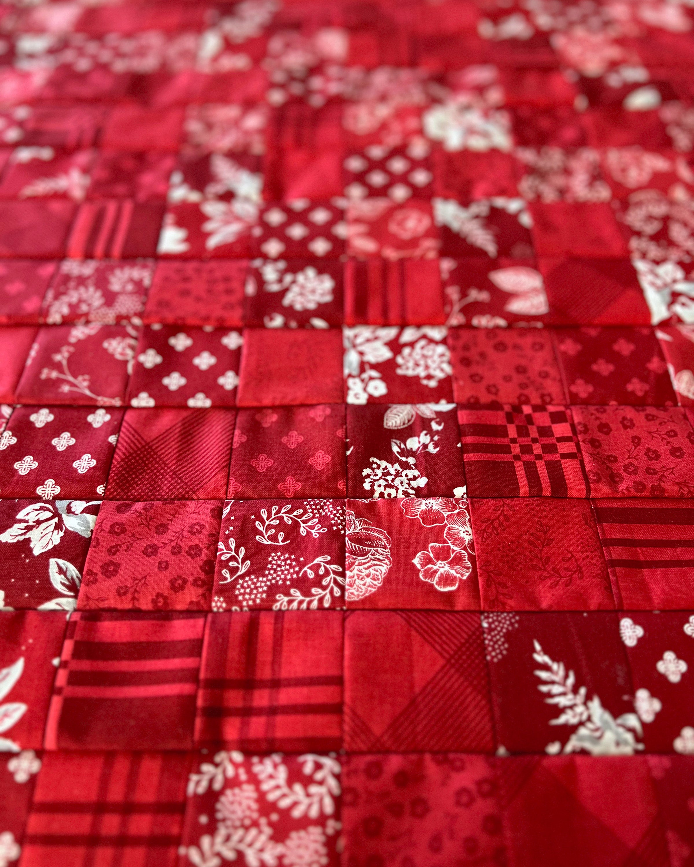 up-close on scrappy version Send with Love quilt