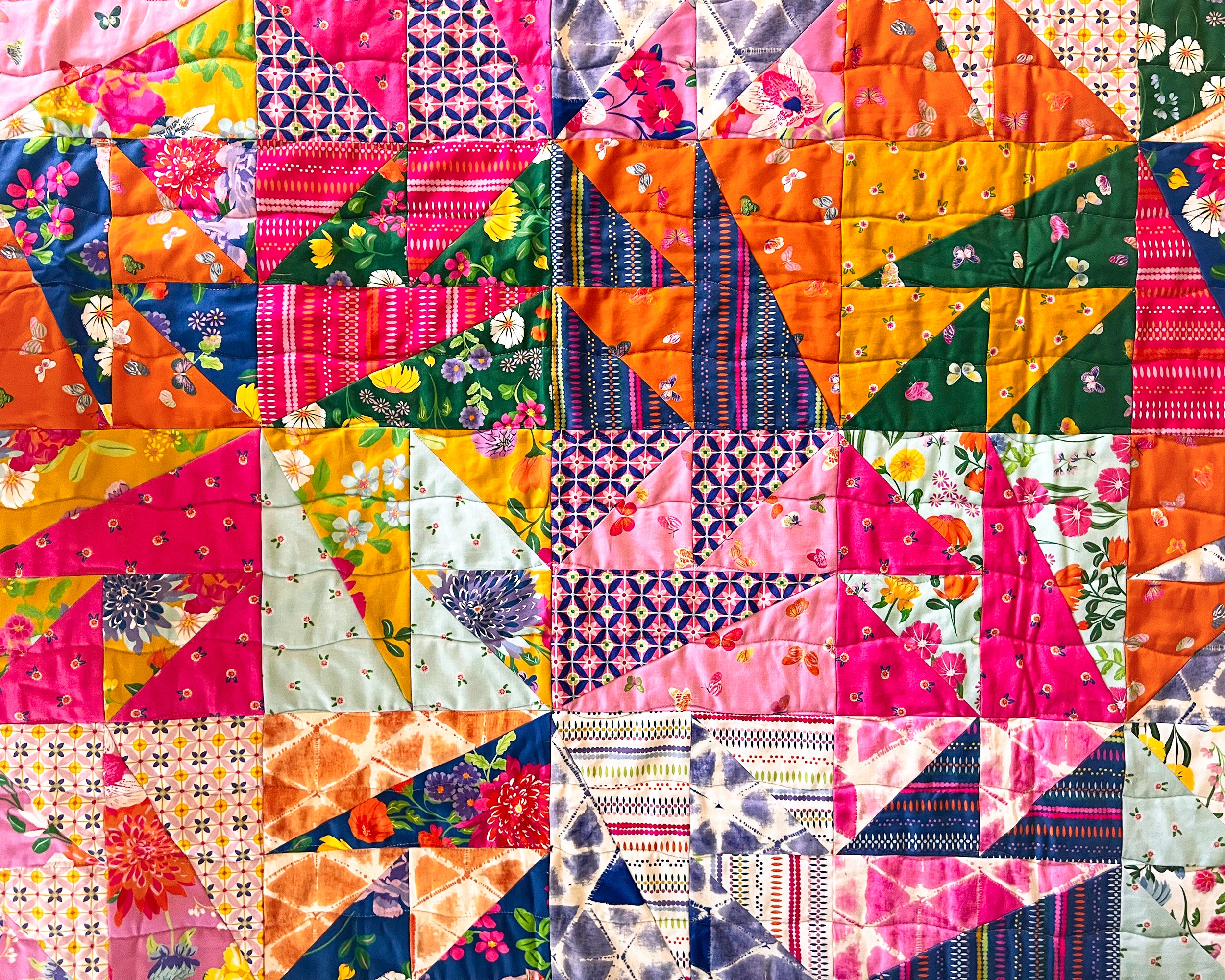 Gettin' Tipsy Quilt close up made with Splendid fabric from Riley Blake Designs