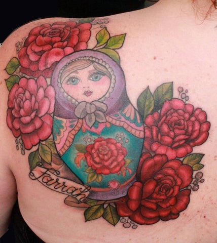 Matryoshka doll tattooed on the achilles fine line