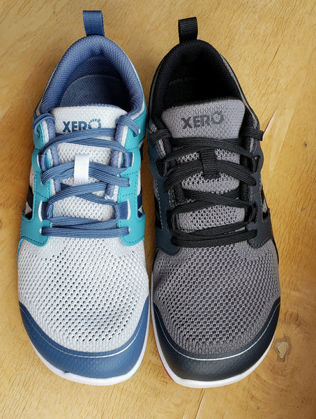 A pair of women's Xero Zelen sneakers, one off-white and blue, the other gray and dark gray