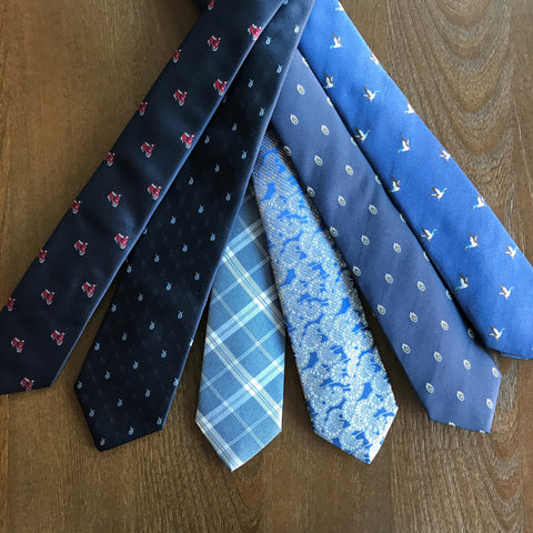 Various blue design neckties