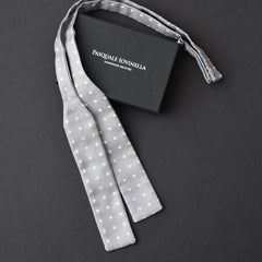 Grey with white polka dot bowtied