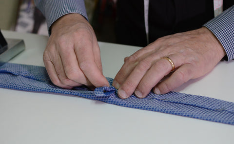 Pasquale Iovinella handcrafting a necktie
