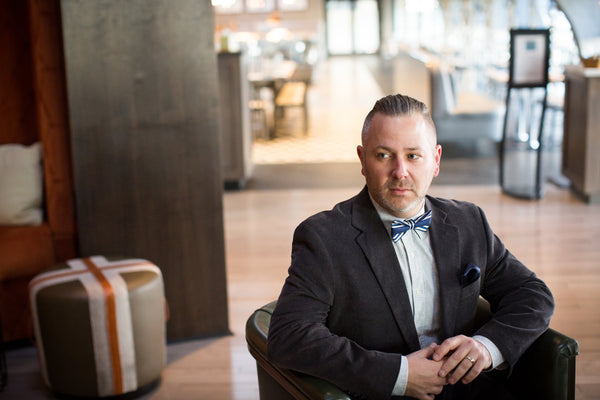 Man sitting wearing bowtie