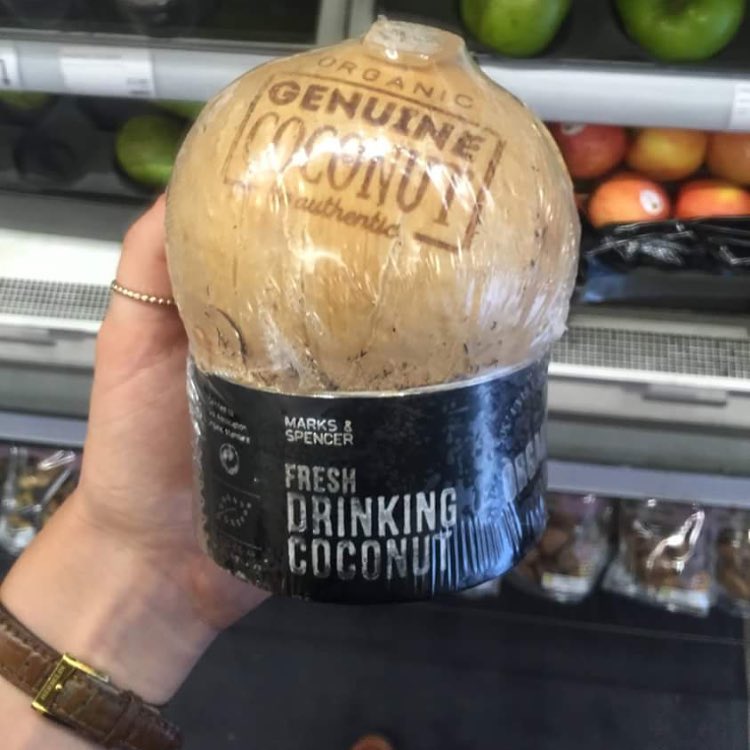 Coconut wrapped in plastic
