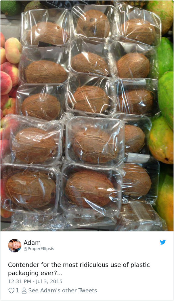 Coconuts wrapped in plastic in a supermarket