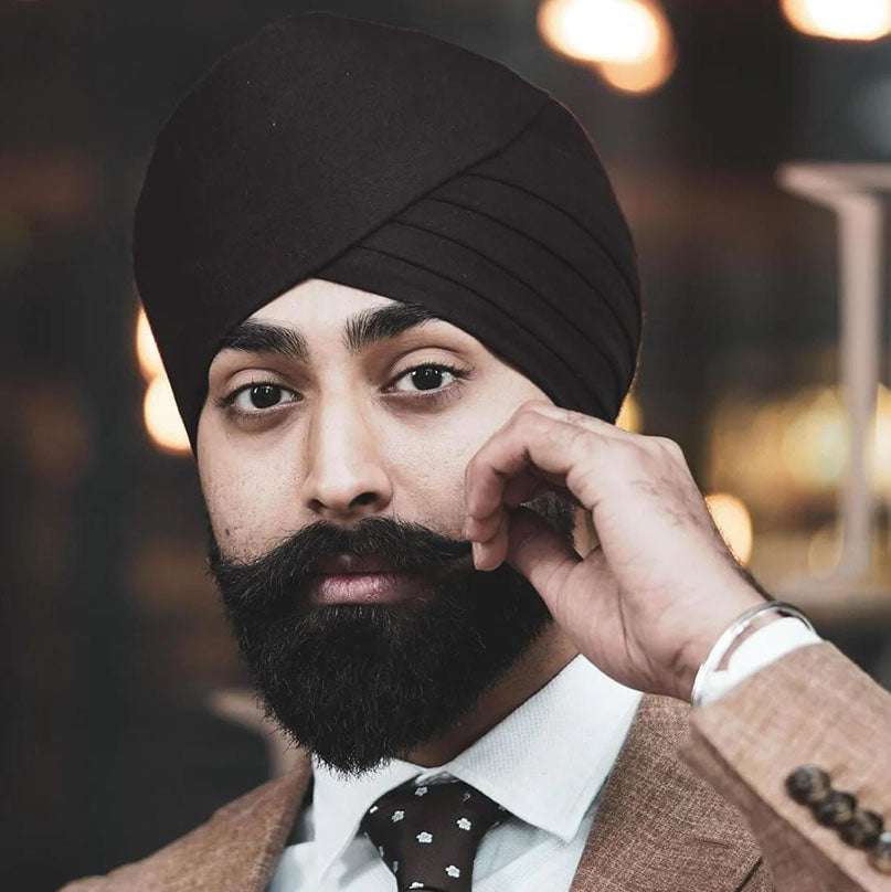 Man wearing a brown turban