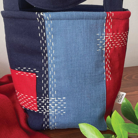 Handmade bucket bag with slow stitch
