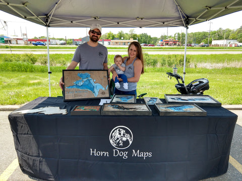 Mitch Heil of Horn Dog Maps at a craft show displaying his maps