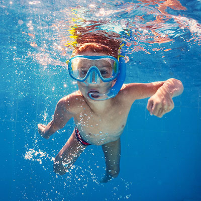 "Kid Swimming Underwater"