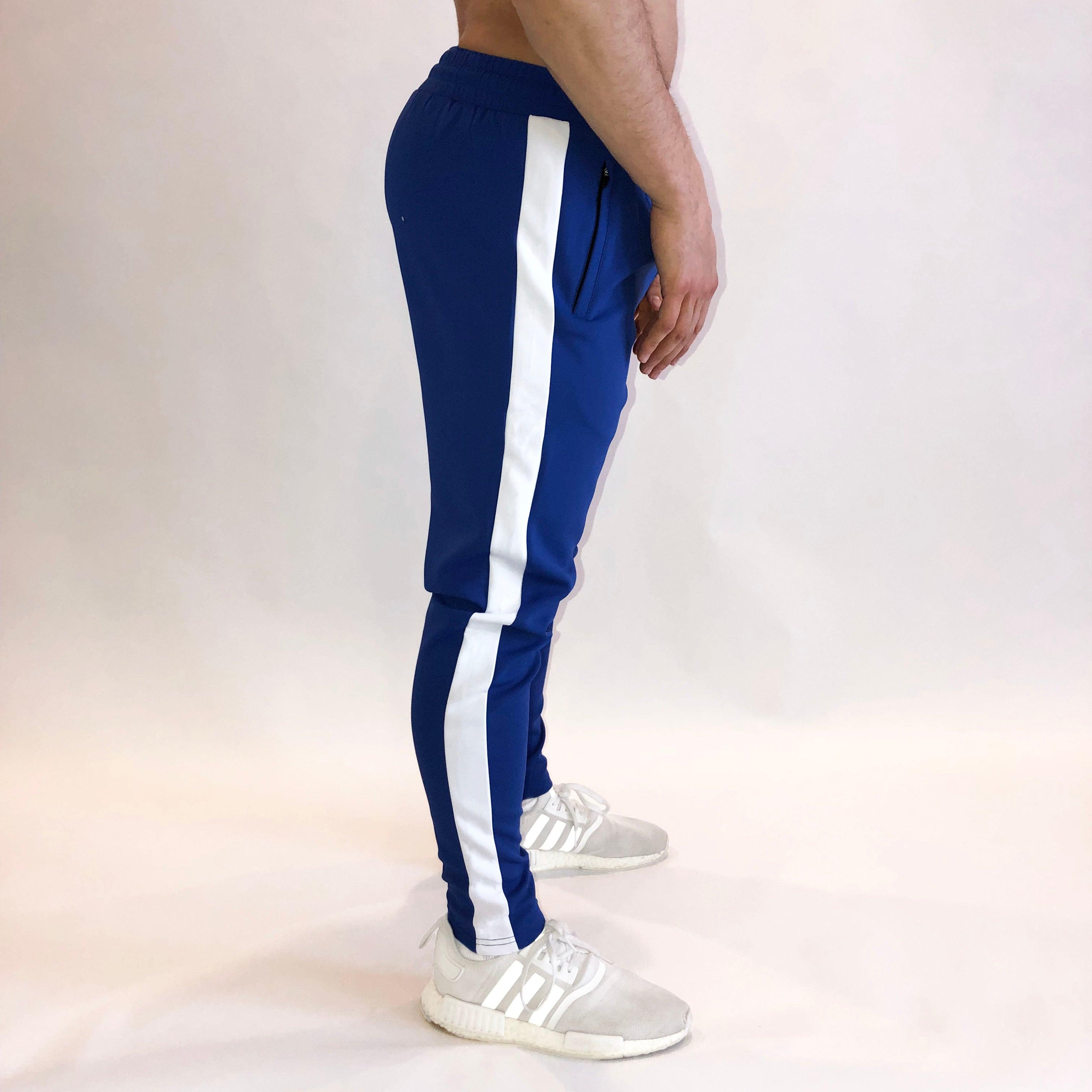 blue joggers with white stripe