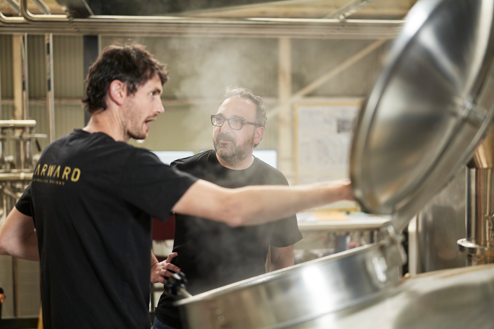 The team adding a personal touch to every whisky bottle