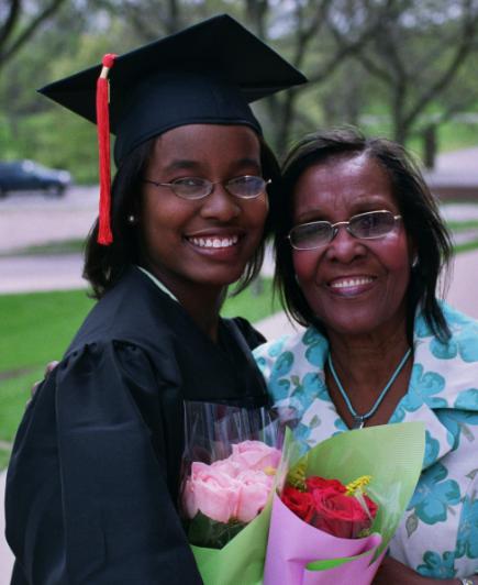 Corinne at graduation with her grandma